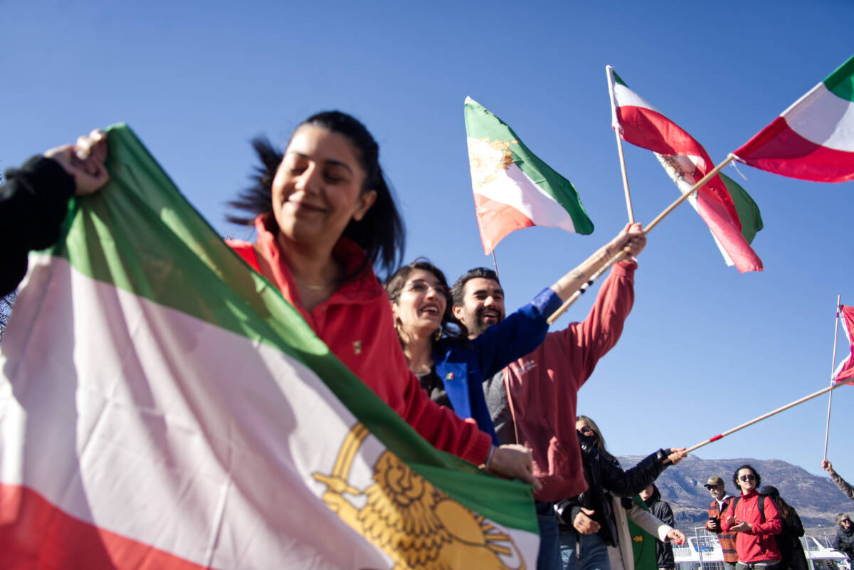 Parade on March 1 as Iranian Canadians in Kelowna celebrate American and Israeli strikes on Islamic Republic of Iran. (Ty Lim/Kelowna Capital News)